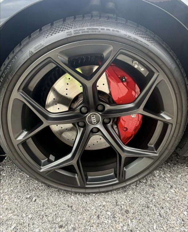 Close-up of detailed wheel and brake caliper